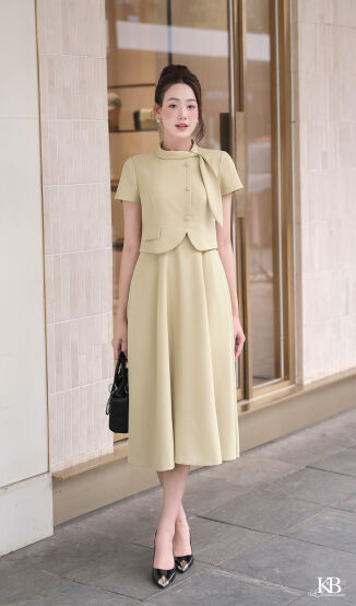 Maxi cổ tròn dây nơ lệch